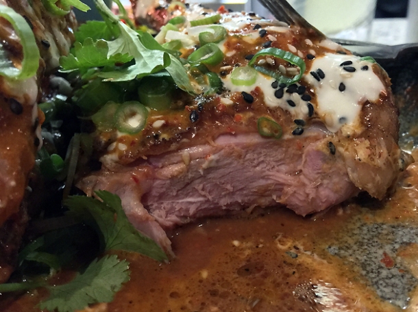 half a smoked duck with red curry sauce at temper city angel court
