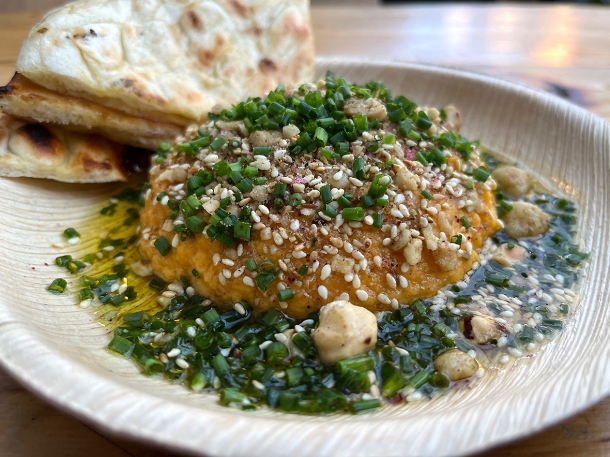 illustrative photo of the fermented squash hummus with macadamias at Acme Fire Cult